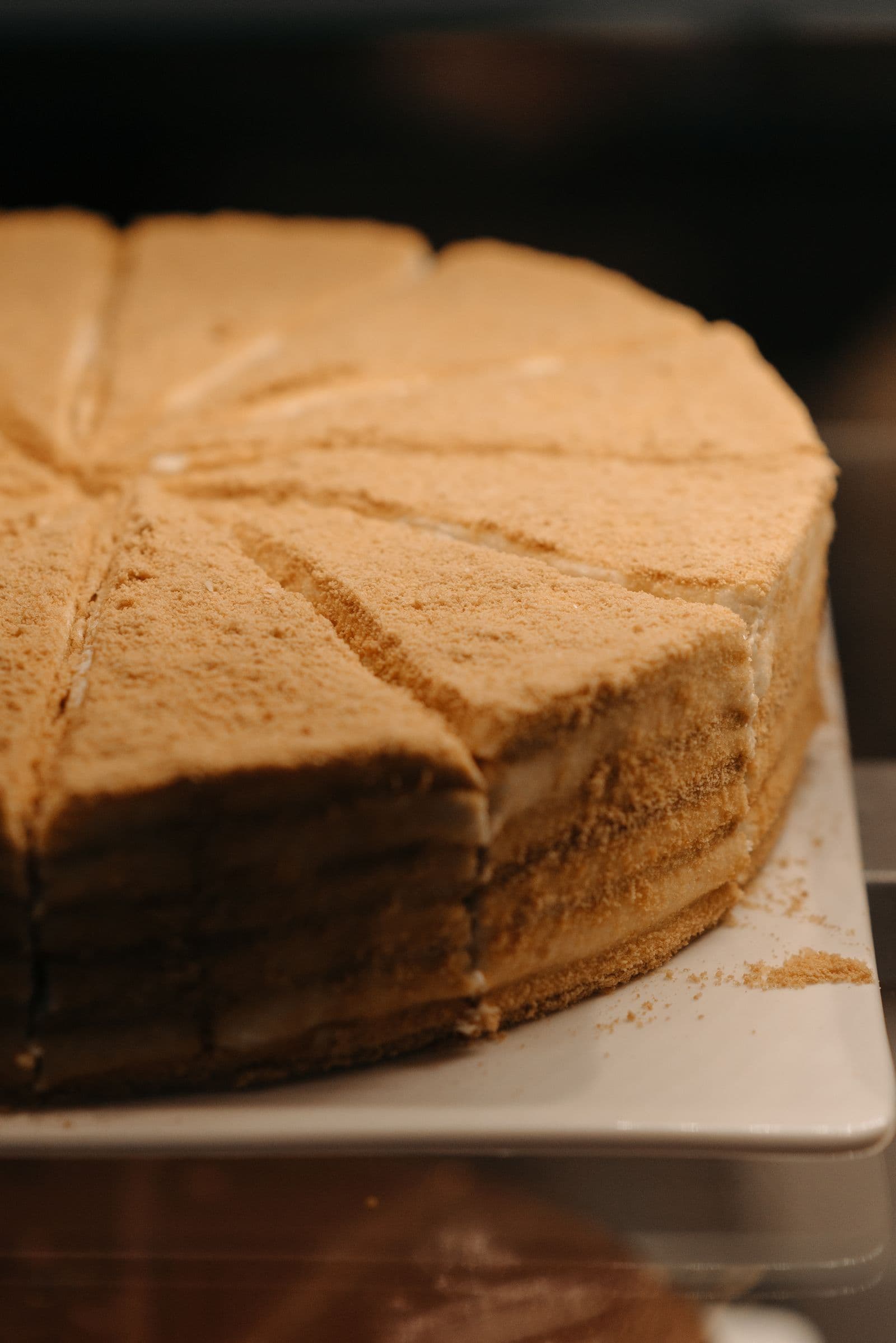 A whole honey cake, cut into slices